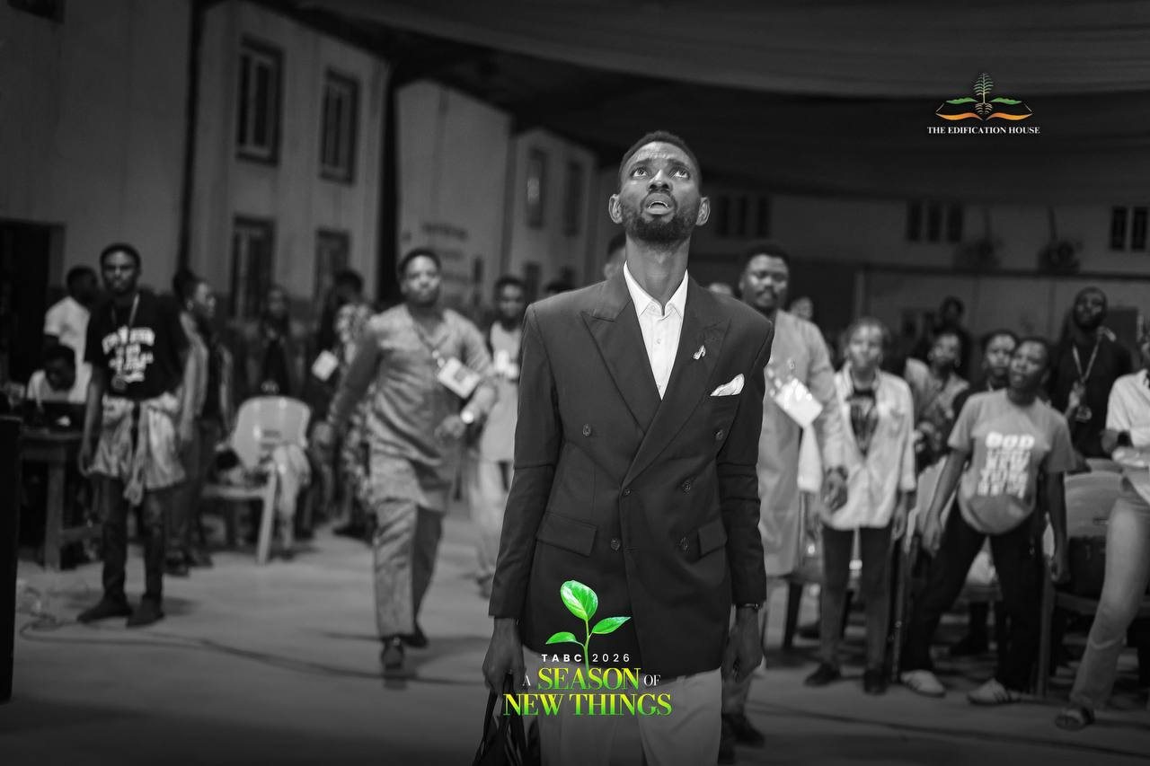 Pastor Popoola among people at a gathering