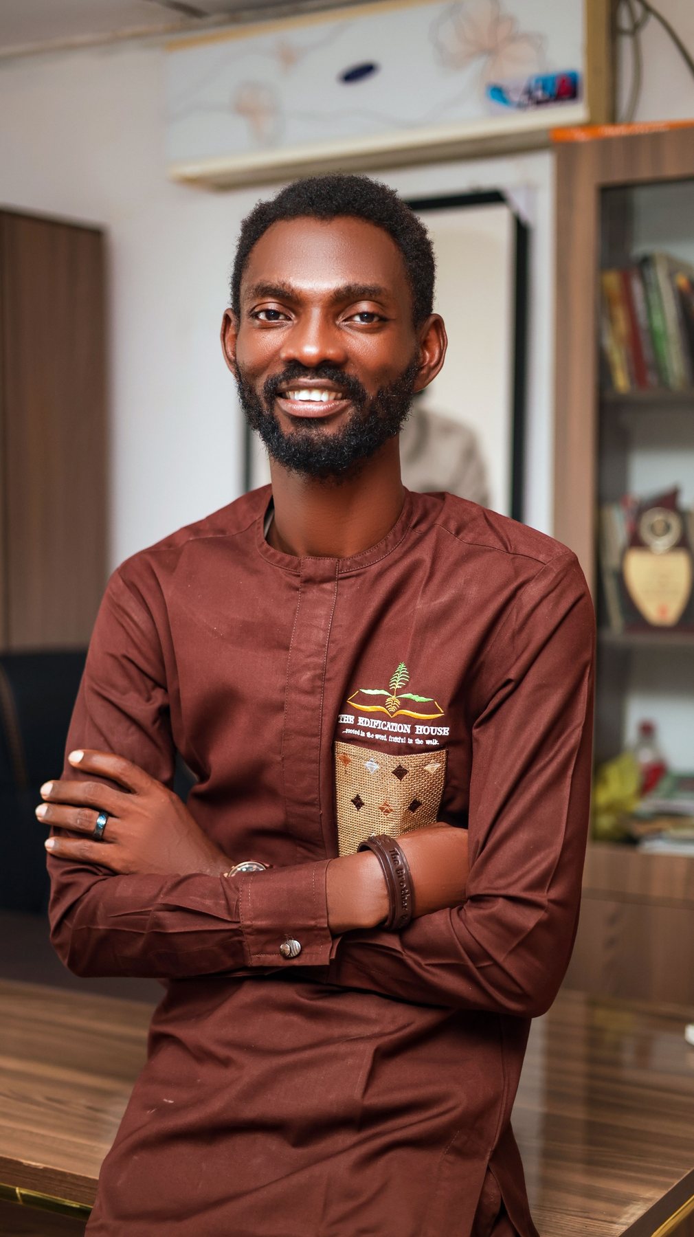 A portrait of Pastor Popoola